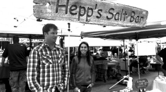 Brian Hepp behind HEPP'S salt bar at a local farmers market 